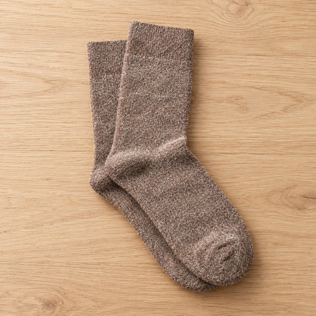 Vanefield knitted merino wool socks in khaki, pair standing