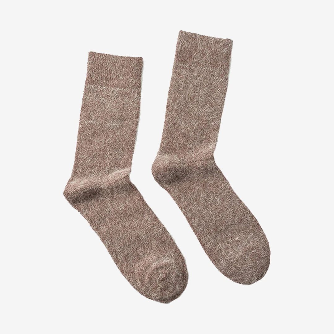 Vanefield knitted merino wool socks in khaki, pair standing