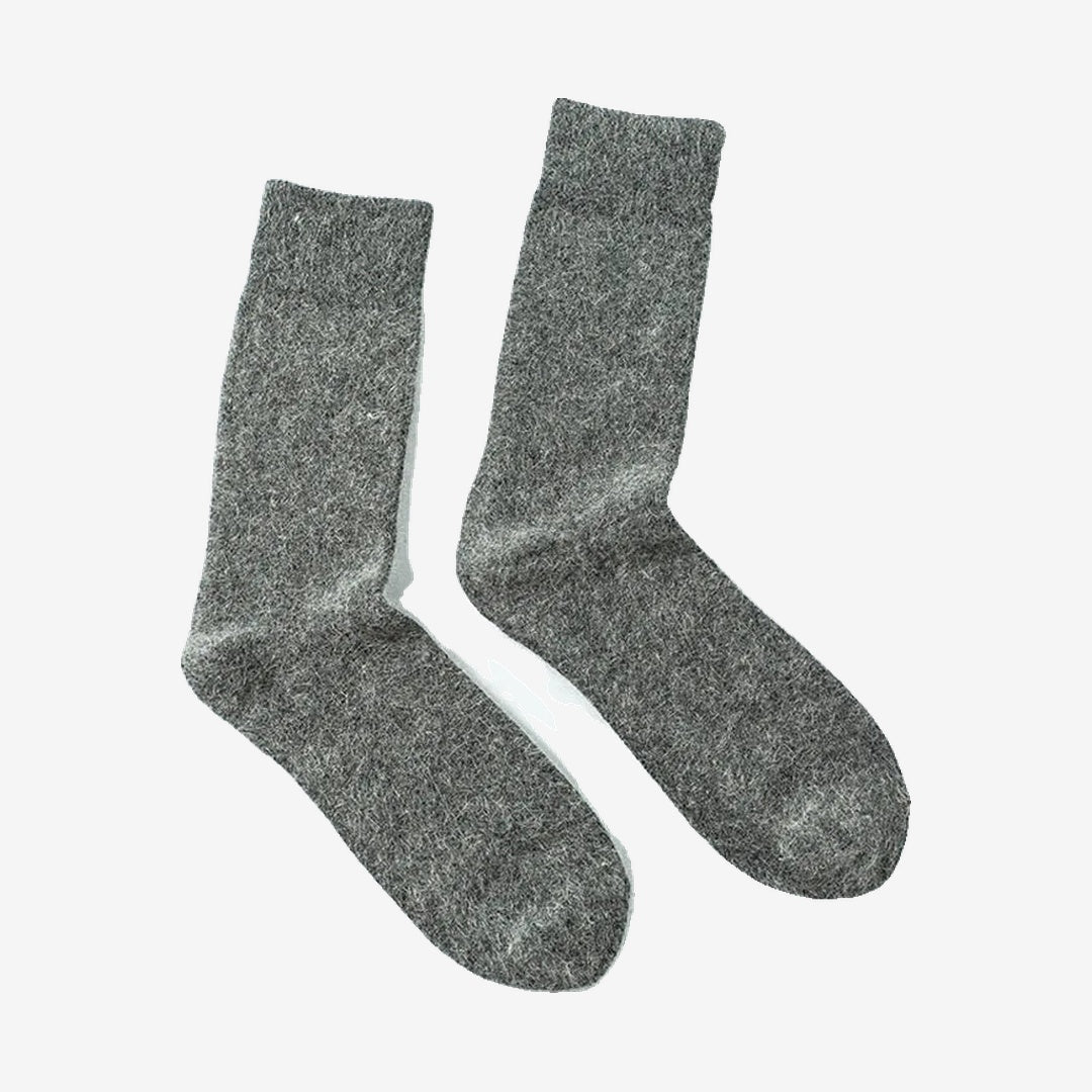 Vanefield knitted merino wool socks in dark gray, pair standing