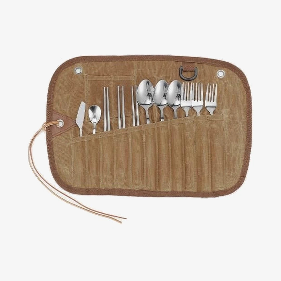 Waxed canvas cutlery roll open on a light background, 12-piece stainless steel set