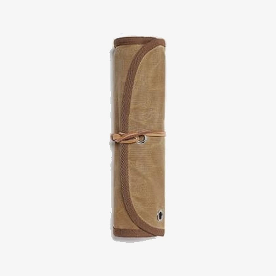 Waxed canvas cutlery roll closed and tied with its leather cord